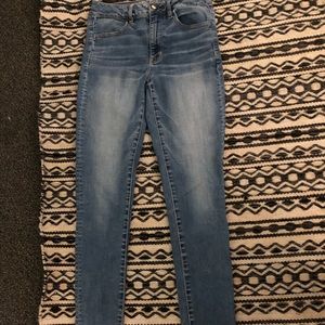Super skinny high rise jegging American eagle jean, medium/light wash, 6 long